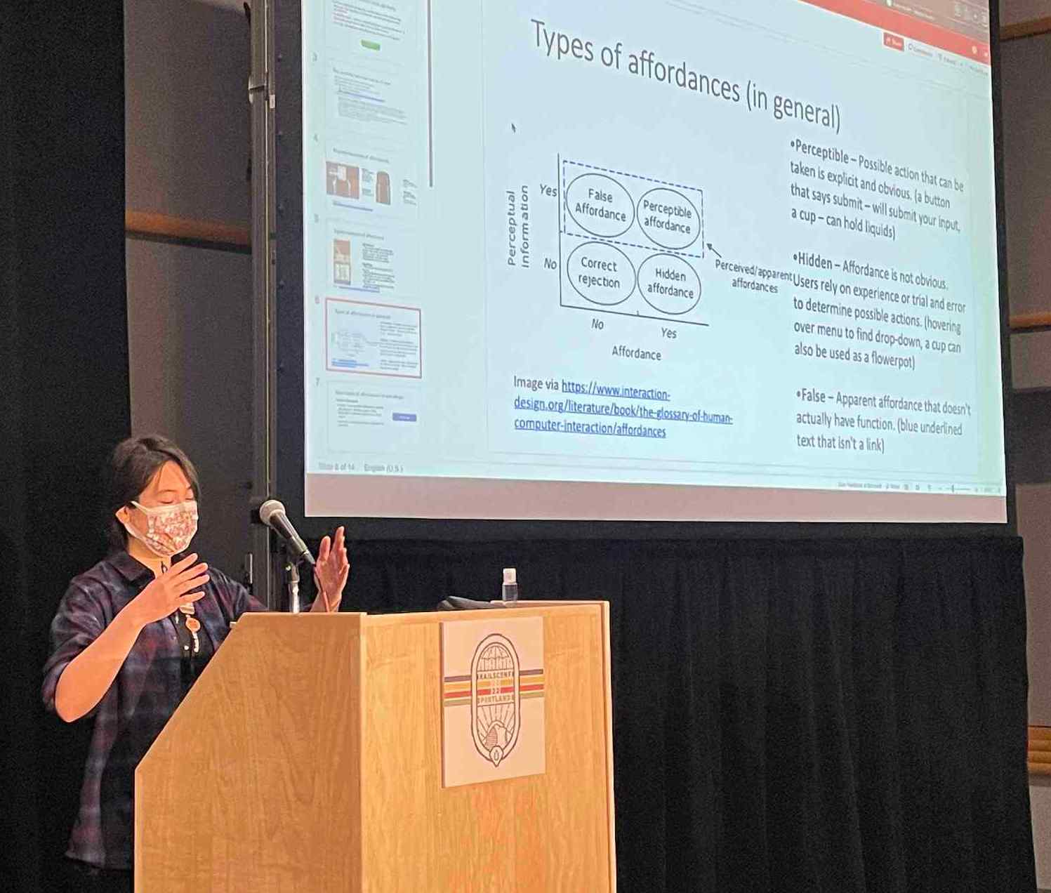 a photo of Ange presenting at railsconf